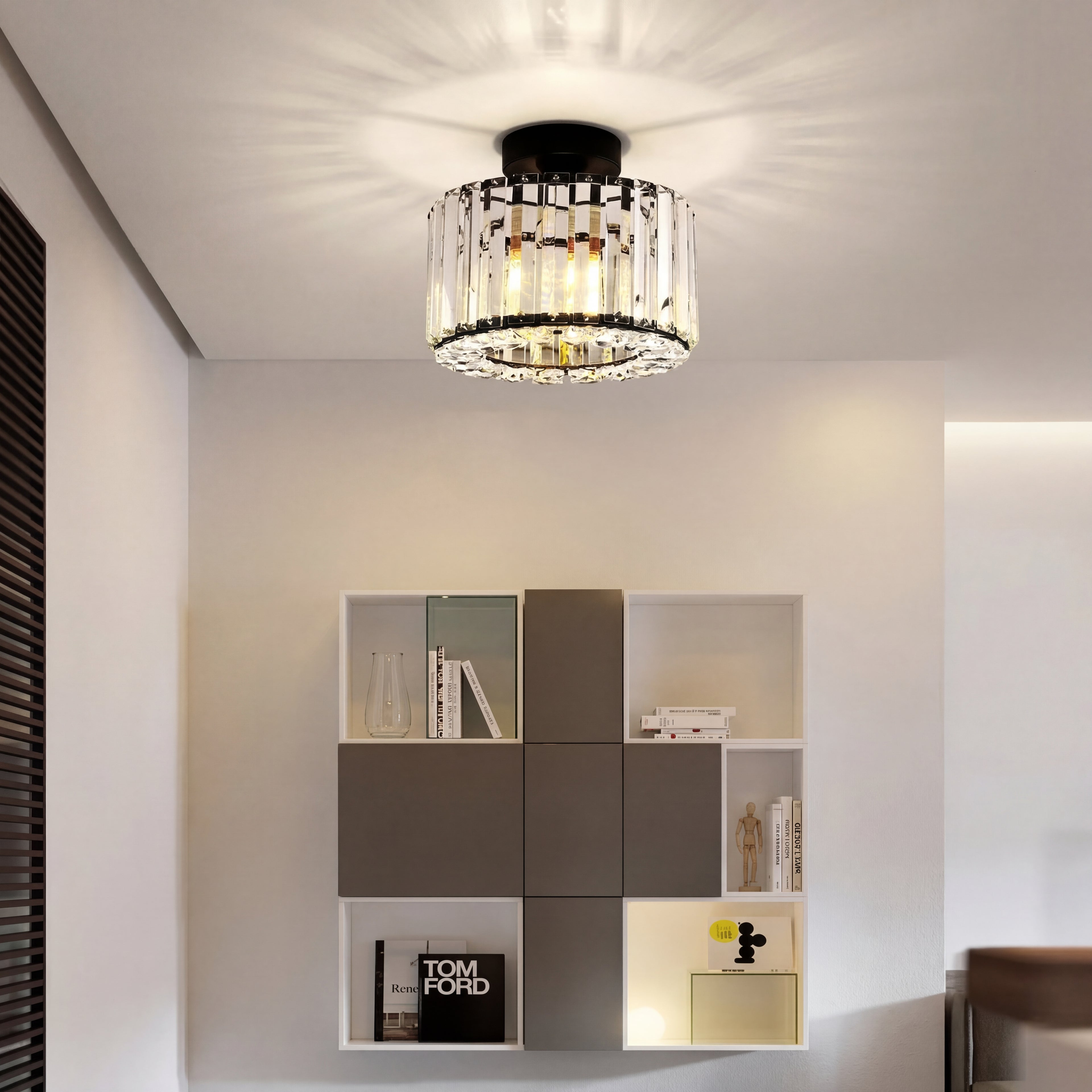 Gold glow reflect light fixture called The Baccarat Light by Glow Reflect, featuring a modern geometric design.