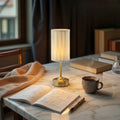 Gold Glow Reflect The Ambient Lamp illuminating a modern living space with warm, soft light.
